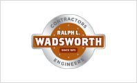 A silver and orange logo for ralph l. Wadsworth