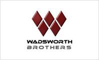 A red diamond logo with the words wadsworth brothers underneath it.