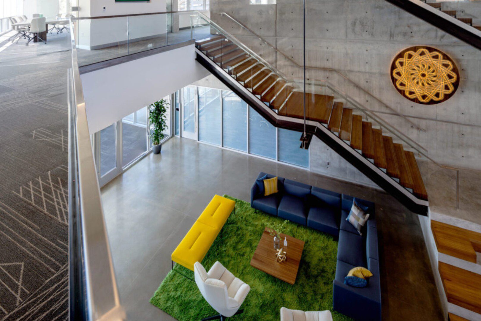 A living room with stairs and a couch